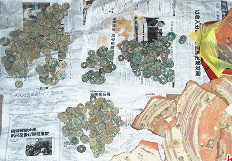 Some of the coins discovered in the Hunan coin pit