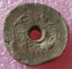Clay burial coin from the Qing Dynasty