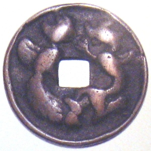 Reverse side of football charm displaying dragon and phoenix