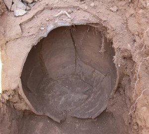 The ming knives were discovered buried in this clay pot