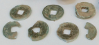 Xin Dynasty Coins Found in Korean Tomb thumbnail