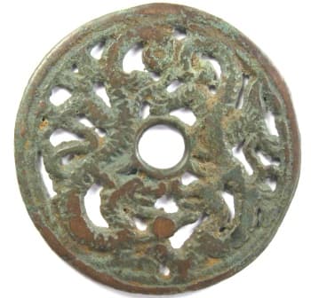 Open work charm
          with the heads of two dragons facing each other