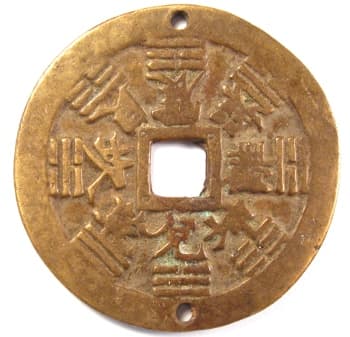 Eight Trigram
            (bagua) charm used on ridgepole of traditional Chinese
            house