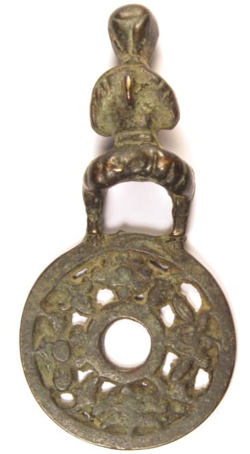 Reverse
              side of pendant charm with boy on top