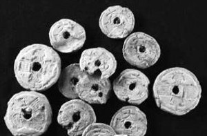 Clay burial coins which imitate Song and Jin dynasty coins discovered in a tomb in Shanxi Province.