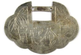 Chinese silver
          lock charm with inscription "longevity, wealth and
          honor"